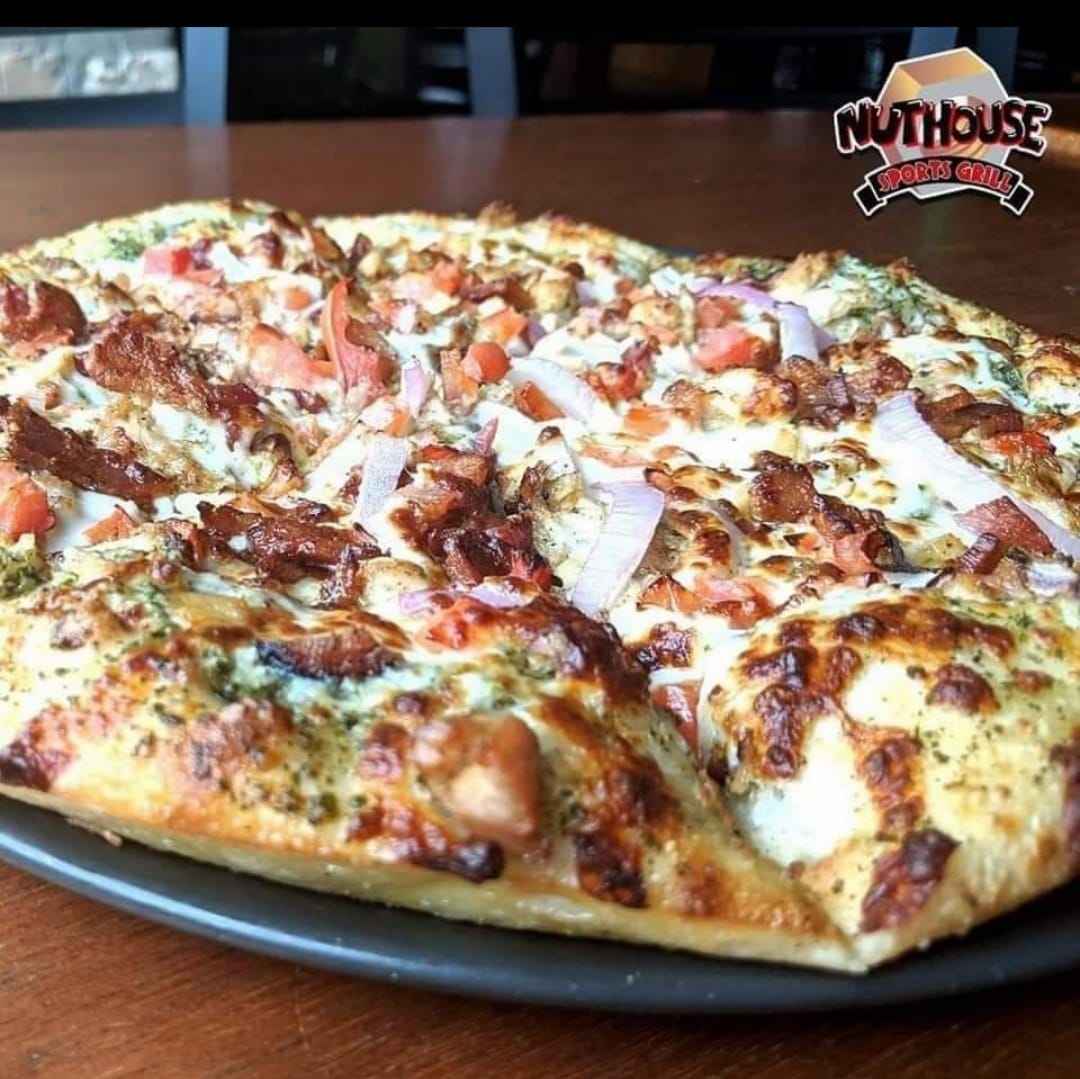 Downtown Lansing (@downtownlansing) on Twitter photo #GrubLansing at <a href="/nuthouselansing/">NuthouseSportsGrill</a> tonight with one of their Grand Slam pizzas, cold drinks and a game of pool. #GrubLansing at <a href="/nuthouselansing/">NuthouseSportsGrill</a> tonight with one of their Grand Slam pizzas, cold drinks and a game of pool.