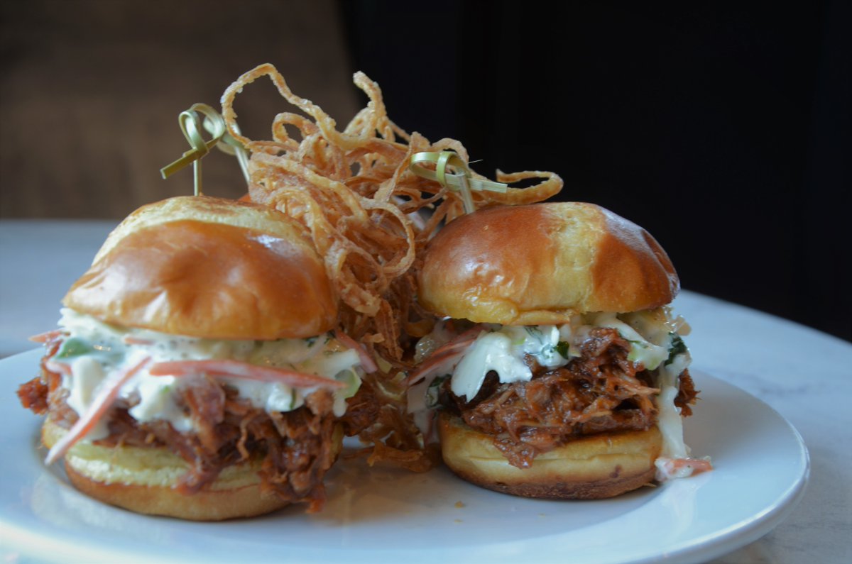 #FeatureFriday! This week we feature our savory Smoked Pork Sliders smothered in our BBQ sauce, coleslaw, and fried onions!