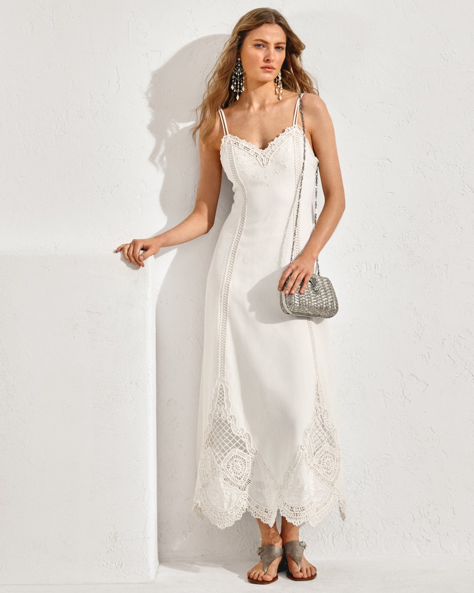 RalphLauren's tweet photo. Embroidery delicately trims #RLCollection’s Xaviera Linen Voile Sleeveless Day Dress, a lighter-than-air silhouette for the season

Discover more from #RLCollectionSS22: https://t.co/tG2LlcY4fI. https://t.co/tf04UqVk6w
