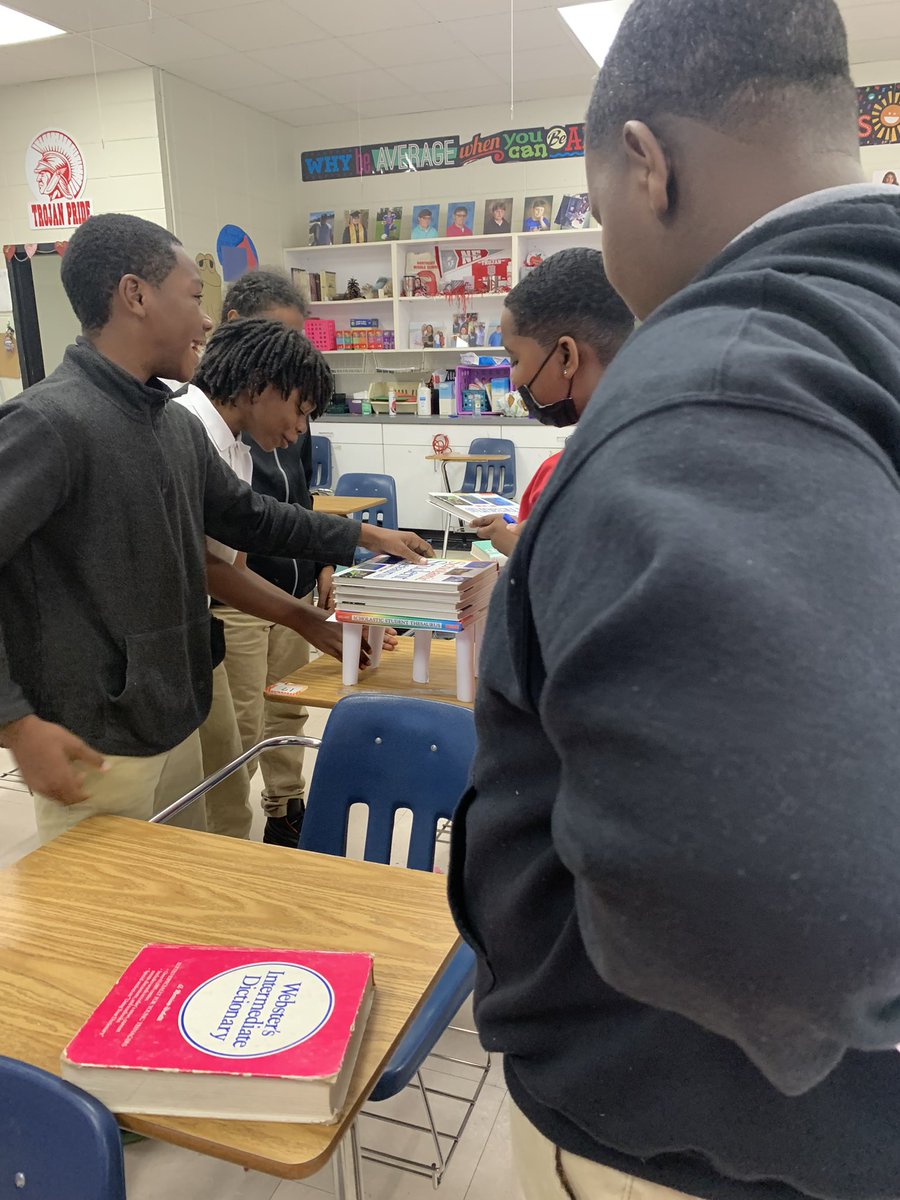 DeniceDMoore's tweet photo. After testing today @NEMSTrojans, my STEM Club had a fun time with the construction of paper bridges to test which team’s bridge could hold the most books. Another competition was on who had the best flights with their paper airplanes. @Deborah13302644 #LCSDExcellence https://t.co/6KwP2AXyJp