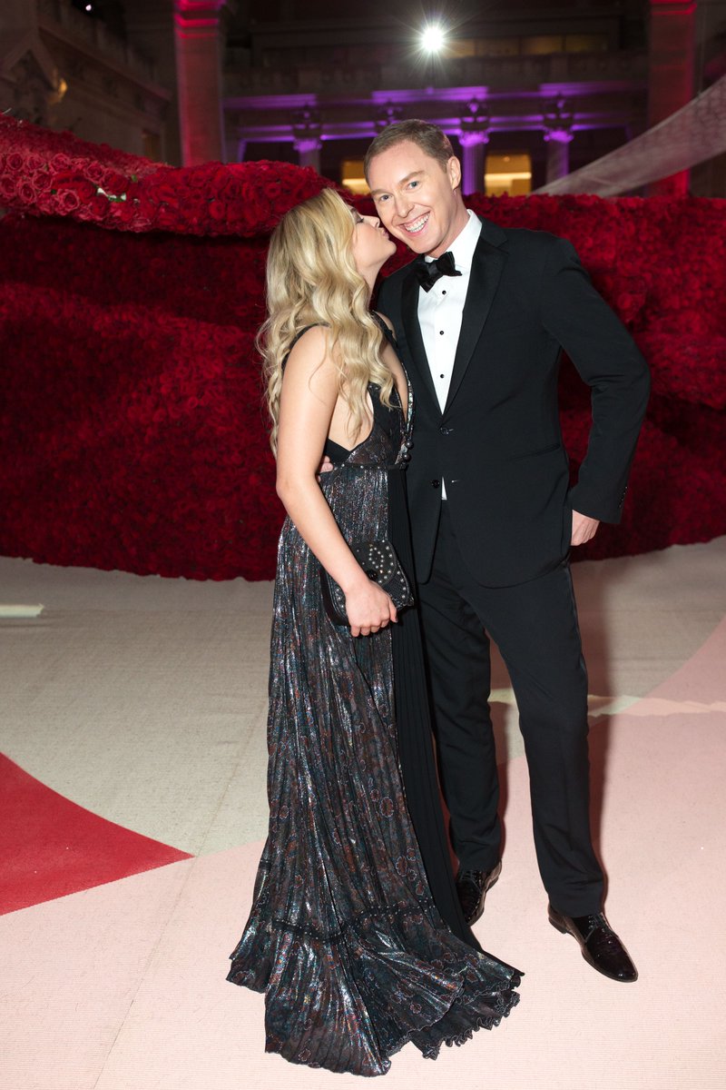 Coach's tweet photo. She's beauty and she's grace—she's #ChloëGraceMoretz at the 2015 &amp; 2016 #MetGalas. (Accompanied by the one-and-only #StuartVevers.) 🖤 #MetGala2022 #CoachNY https://t.co/PoQuf8boM9