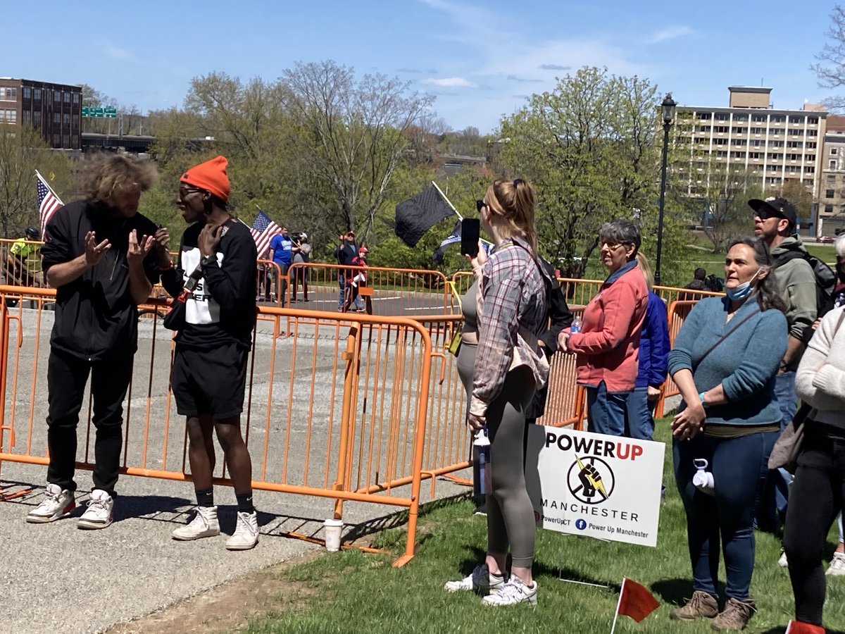 Black Lives Matter supporters at a rally at the Capitol watch as Freedom Convoy marchers pass by. The rallies ended without incident.