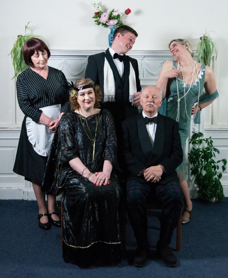 TheGrads's tweet photo. Judith Bliss and family (not forgetting Clara the devoted housekeeper) in an informal portrait, Bliss-fully unaware of the challenging weekend ahead. Come see what transpires in @NoelCowardSir's classic comedy Hay Fever @AssemblyRoxy 18-21 May. Tickets: https://t.co/DslTFPUEnA https://t.co/kPV1mkp9nv