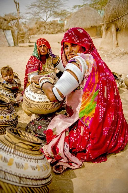 each #photo tells a story? guess? hardship of village life? #women #water weather traditions society? @NatGeo caption it?