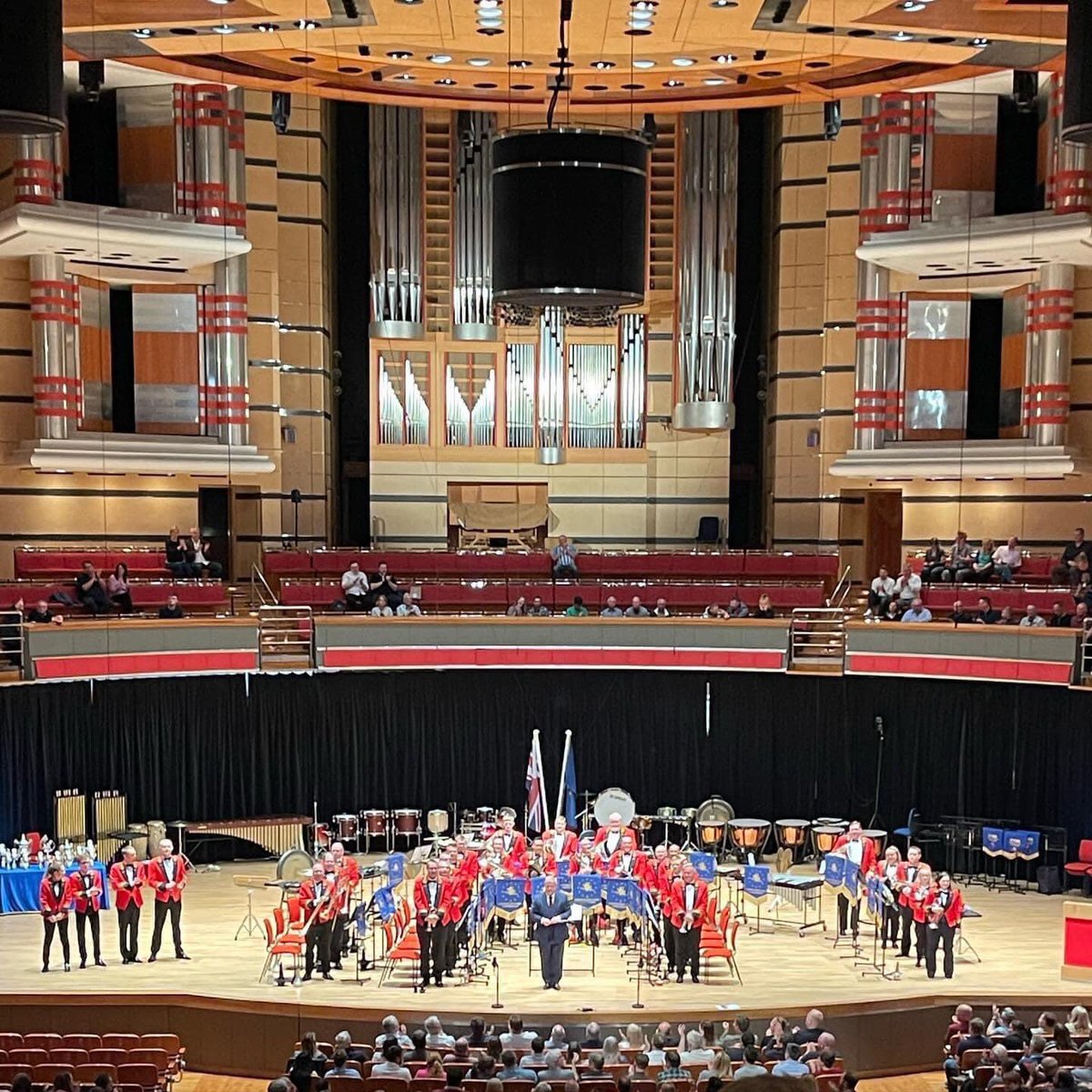 <a href="/fodensband/">Foden's Band</a> at the conclusion of our performance of Wilby’s superb set test piece, ‘Saints Triumphant.’ An early draw, but we gave our all. Great atmosphere in the hall. Looking forward to our own choice performance tomorrow. @EBBC2022 <a href="/BrassBandsEng/">Brass Bands England</a> #ebbc2022 #ebbf #EBBF2022