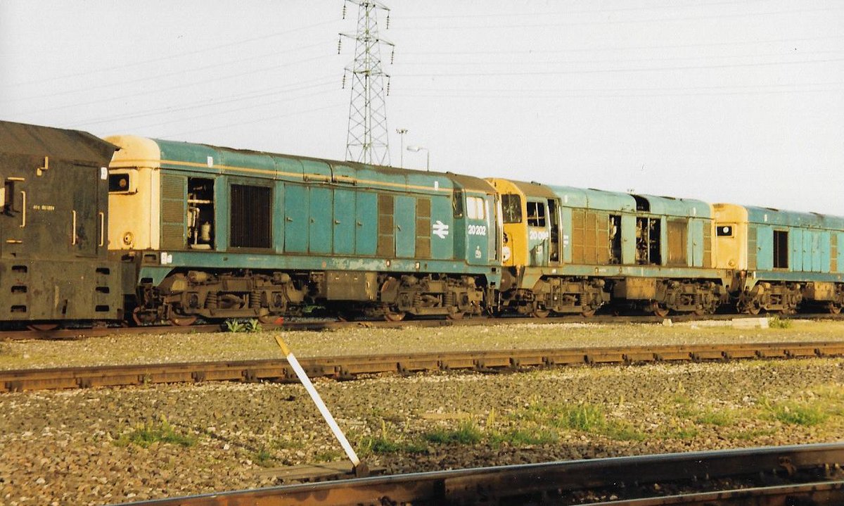 Toton 17th May 1992 In the scrap line, British Rail Class 20 diesel locos 20202 & 20099 present a sad sight. Both Choppers would head north for scrapping at MC Metals, Glasgow #BritishRail #Class20 #Choppers #Toton #BRBlue #trainspotting #Diesels 🤓