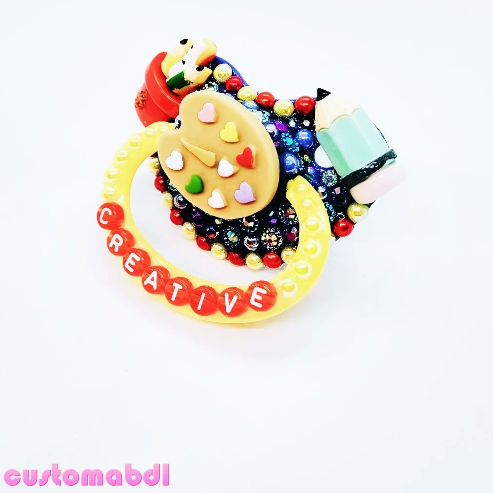 customabdl's tweet photo. I have designed dozens of art themes over the years &amp; I believe this one to be my favorite!  Maybe it's the nostalgic primary colors or perhaps the affirmation that yes, you are creative!  We all are in our own special way!
#adultpacifier #abdl #ddlb #mdlb #ddlg #ageplay https://t.co/xrcproXn7I