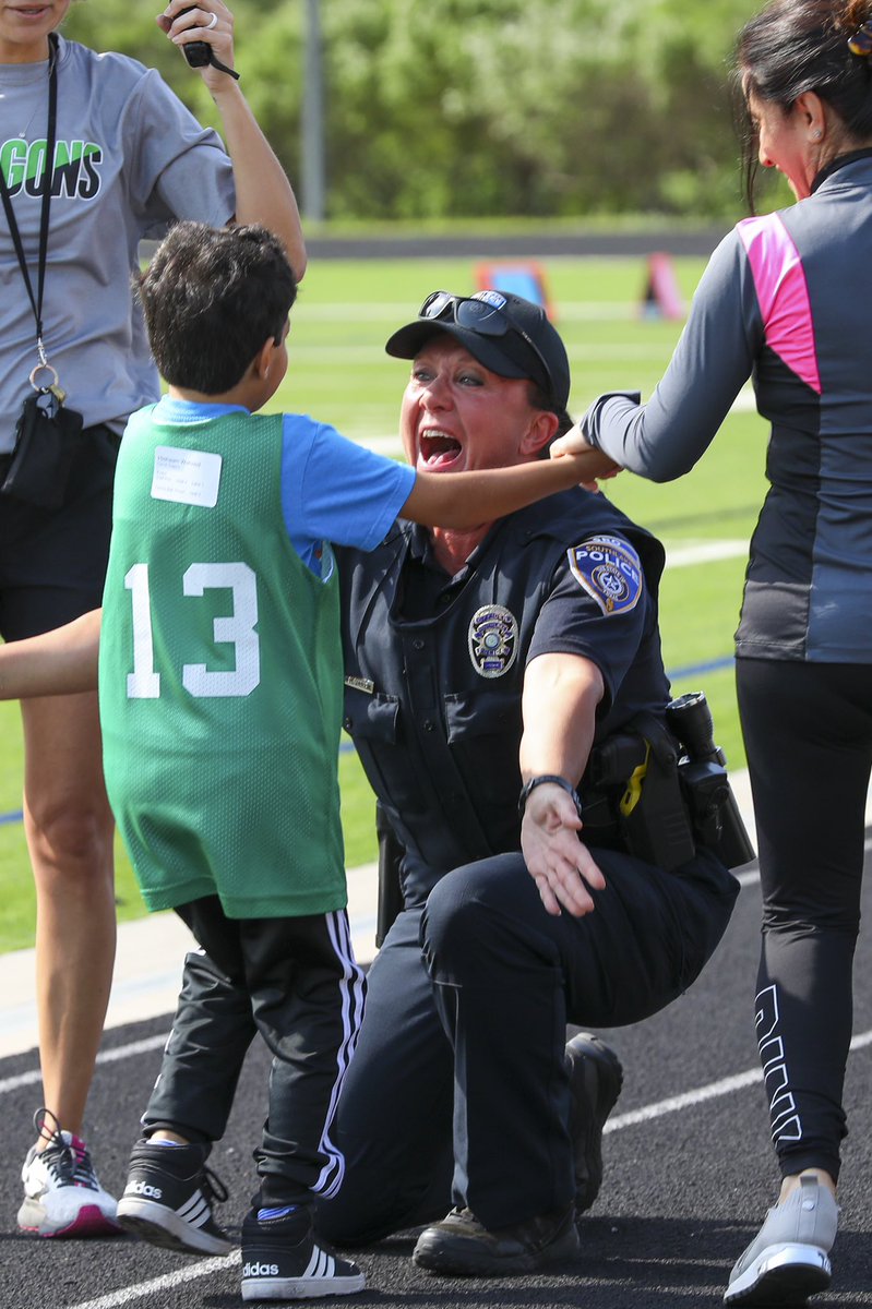 OfficerKimWges's tweet photo. His excitement shows in his hugs!! Loved cheering on this WGES Dragon all star and every athlete of the Special Olympics today and walking the opening ceremony with my SRO Team! This is what makes being his Officer Kim the best ever!! #SROLIFEROCKS @NASRO_Info @WGESdragons https://t.co/4HFFOS9iov