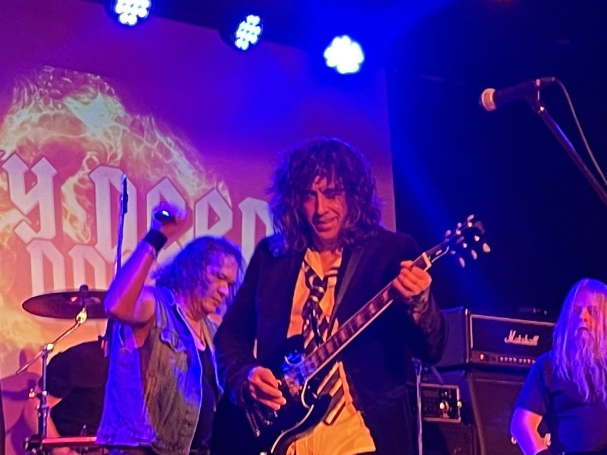 OriginalCTrain's tweet photo. ⁦@BrucioMcCulloch⁩ didn’t realize that when he’s not crushing heads ⁦@kevinthekith⁩ is rocking the greatest Canadian AC/DC tribute band #DirtyDeedsDDC #KidsInTheHall https://t.co/pSRlEOHhSC