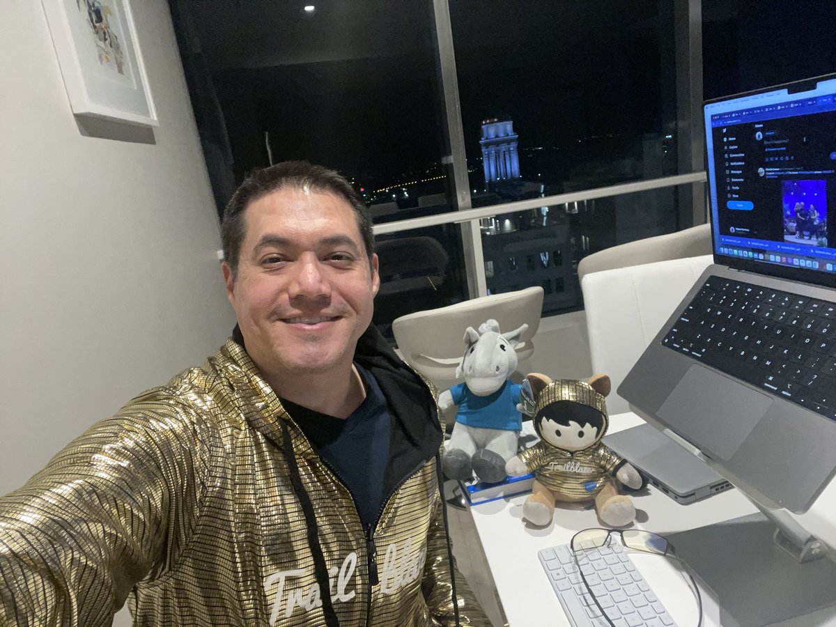 Me at 4 am with my Golden Hoodie, Golden Astro, and Max. I stayed all night replying to Tweets from #TDX22 I was not very active on Twitter, but now I am. 😅 Now I'll continue on LinkedIn. How do you all manage to Tweet all day?! 😂 #LifeWithGoldie #Trailblazers <a href="/MuleDev/">MuleSoft Community</a>