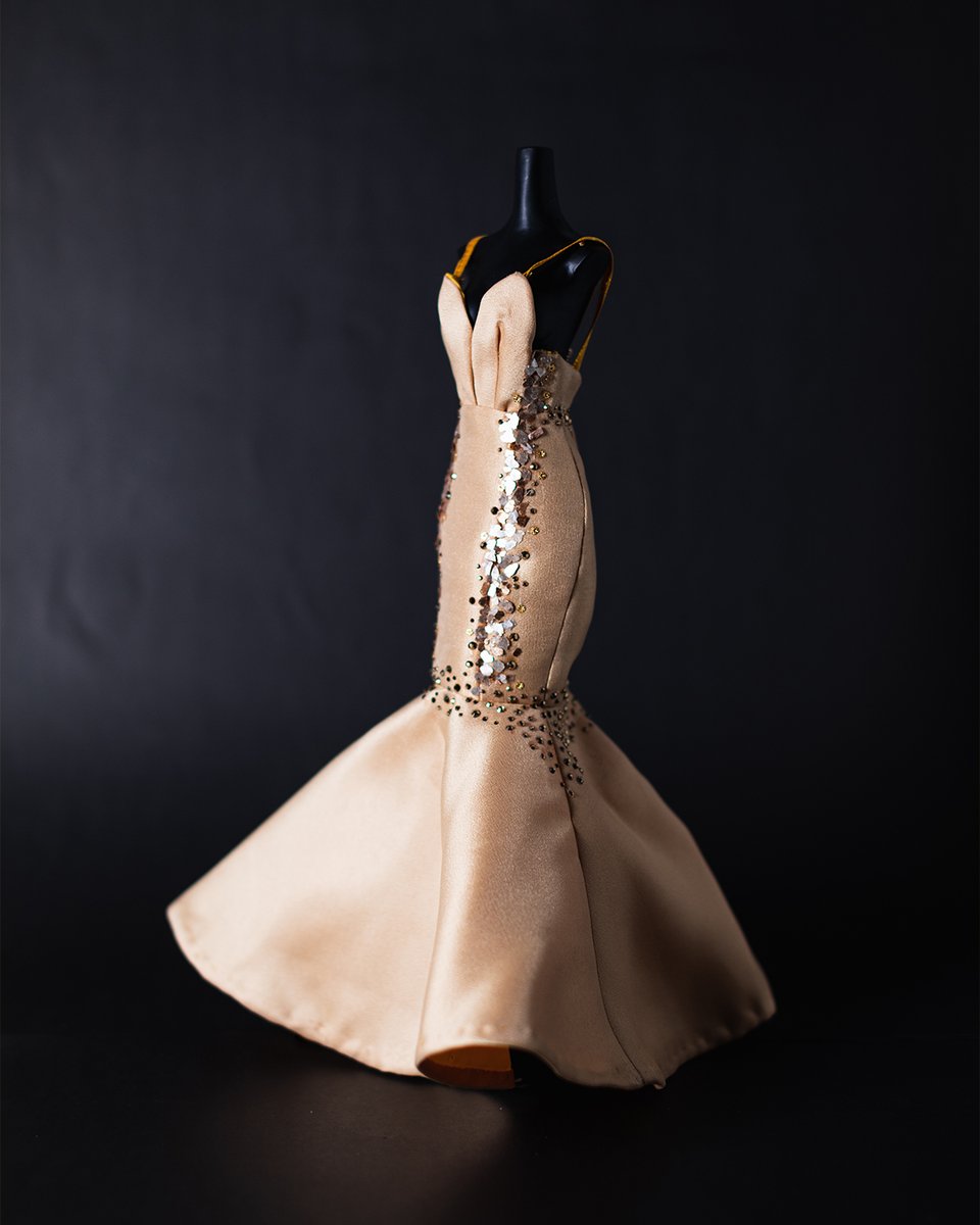 csbcampusart's tweet photo. “Ilan-ilan” by Nicole Ann Pura is one of 41 student designers’ miniature garment creations inspired by the work of Ben Farrales.

The miniature dresses will be part of the upcoming Ben Farrales exhibit at the School of Design and Arts. 

#FarralesXFDM #BenildeCCA #BenildeFDM https://t.co/8rgs1yL3AJ