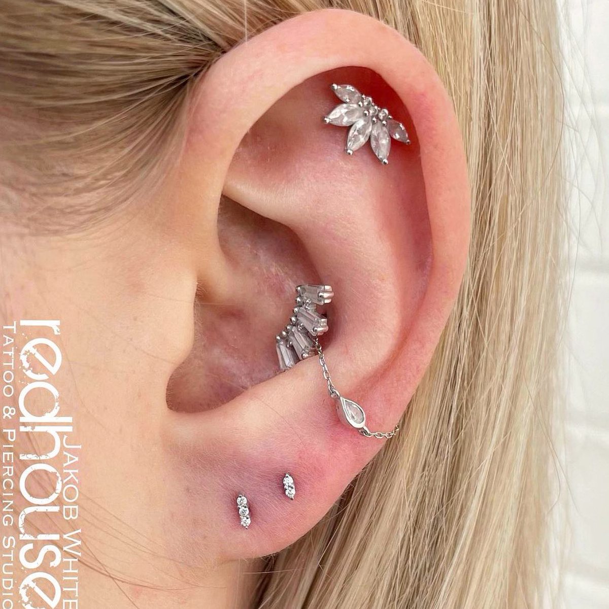 Chic elegance is giving 🤍 Gorgeous work by <a href="/jwhite93/">Jake White</a> over at @redhousetattoobuffalo ✨
#buddhajewelry #earpiercing #legitbodyjewelry #bodyjewelry #bodyjewellery #whitegold #swarovski #cz #style #earcuration