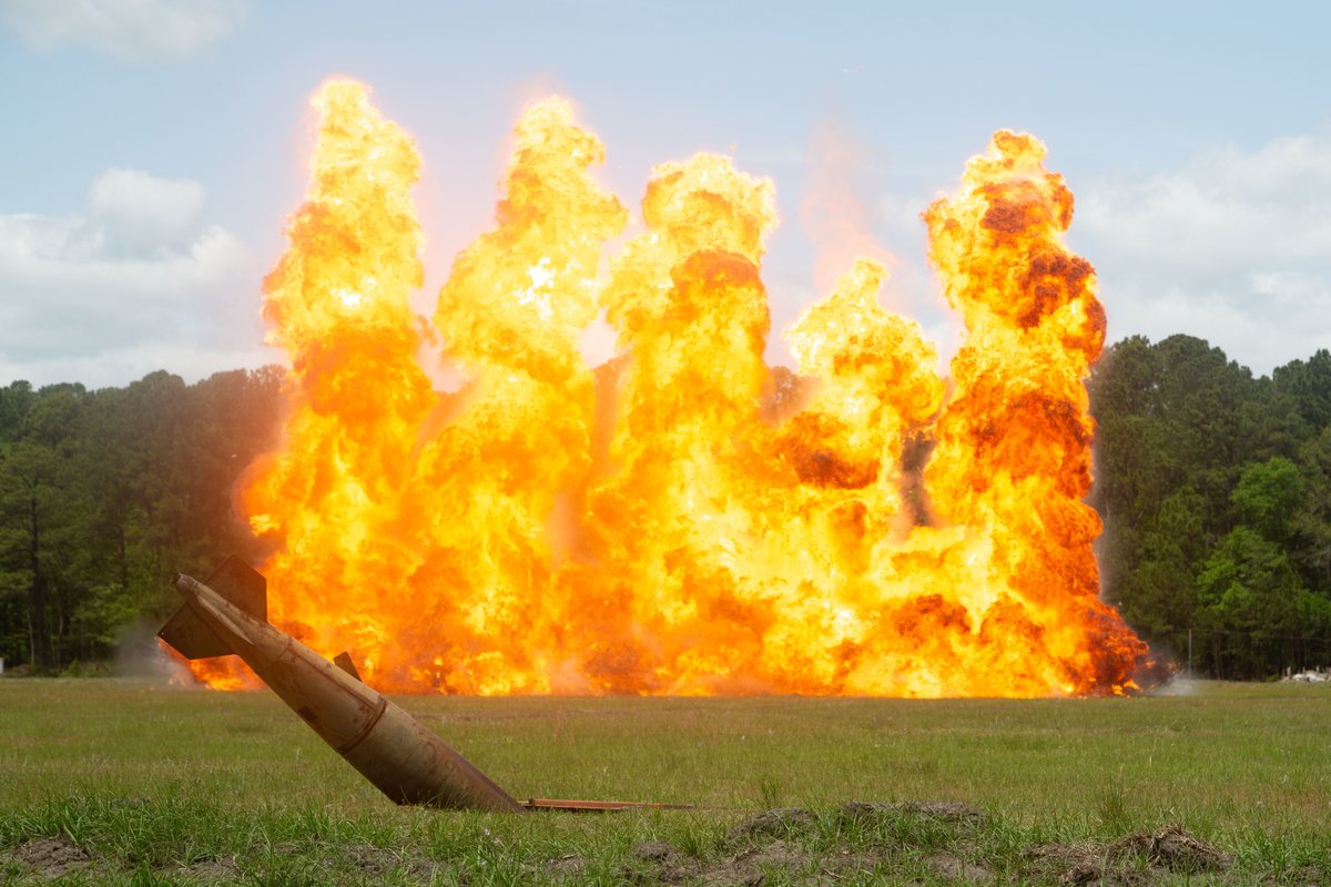 DeptofWar's tweet photo. Fiery display. 
@USMC Marines receive training from explosive ordnance disposal technicians and observe a “wall of fire” demonstration at Marine Corps Air Station Beaufort, S.C. https://t.co/BHtllngxPg