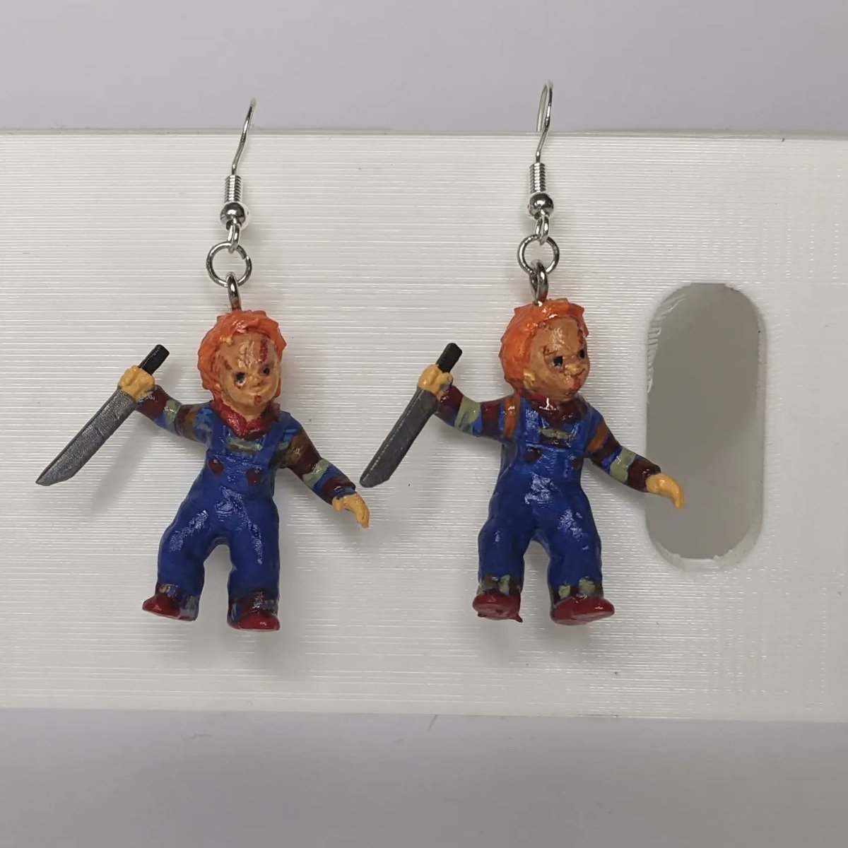 CurnowRyan's tweet photo. Unique Handmade Chucky Earrings 
https://t.co/UFEXeQsRH8
#chucky #earrings #horror #HorrorMovies #scary #handmade #unique #trending #chuckydoll #childsplay #silver #UK #USA https://t.co/dl8lDFi75Z