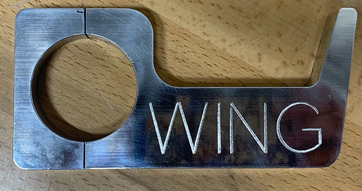 BonneauBuiltMFG's tweet photo. Another engraved helmet hook ready to be shipped out for Brian Miller’s tractor in Iowa! #bonneaubuilt https://t.co/ywtcACzy8x