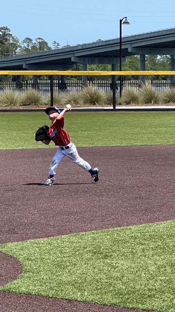 Warming up before the 10U championship game <a href="/TheShipyardPark/">The Shipyard Park</a>. Im mad at the coach he didn’t put me on the bump and he is my dad 😡