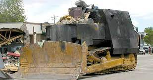 MarkMillFB's tweet photo. Every American Man needs one of these beautiful vehicles for when the government goes too far! Don't forget to pack your M14 Rifle into the back in case those damned police come round! Let's all keep America free by welding our own special dozers! 🇺🇸🇺🇸🇺🇸🇺🇸🇺🇸🇺🇸 https://t.co/KKVQbHH6ui