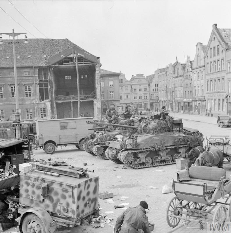 ArmouredBrigade's tweet photo. The Scots Greys reach Wismer, #OTD 2 May 1945.

A Greys Sherman IC Hybrid in front of a Sherman I Hybrid, surrounded by various abandoned German vehicles.

The Greys were in support of 3 Para Bde, 6th Airborne Div.

Taken by Sgt. Oakes
IWM BU 5308 #4ArmdBde #SWW #History #WW2 https://t.co/V8IpNPVviY