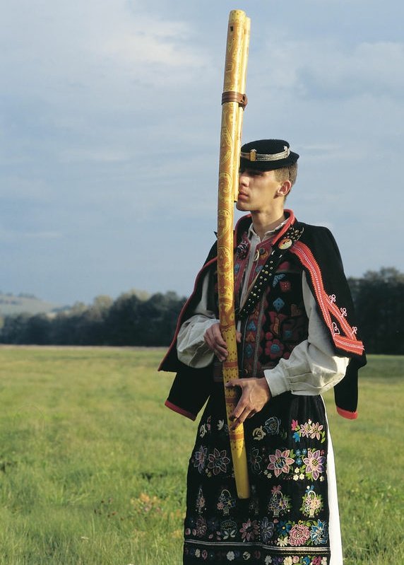 Carpathian men from Slovakia with their fujaras; traditional woodwind instruments of the region.

The fujara was played by the shepherds on their long journeys away from home. It is said when played for the sheep it would calm and ease the herd.