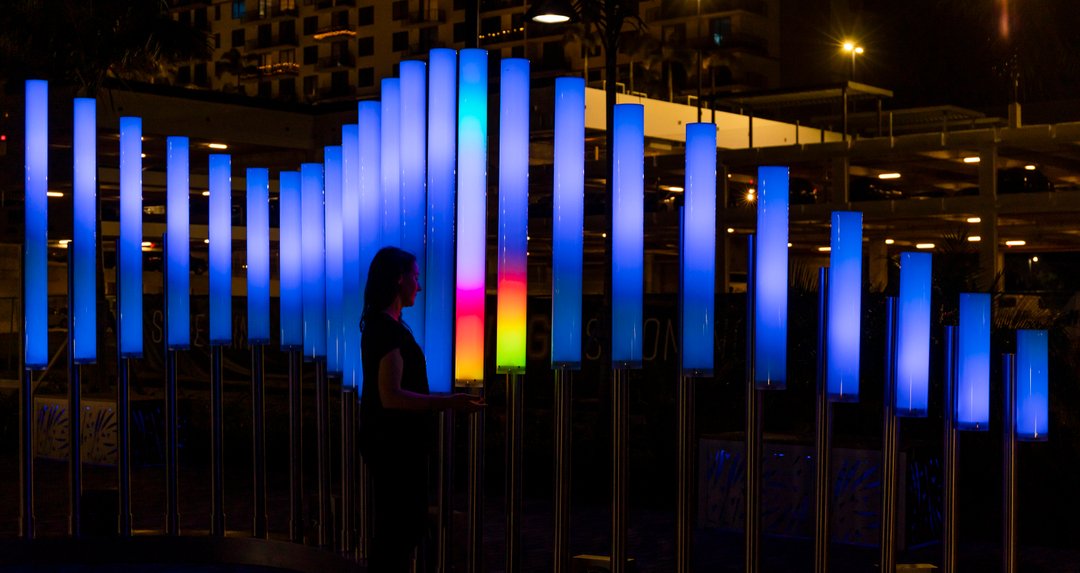 Andante is an interactive wave of light and sound that shifts in tonality depending on the speed with which visitors move beneath each sensor. 🌈

Andante is one of two permanent sculptures positioned at opposite ends of the Doral Paseo in Doral, Florida.
