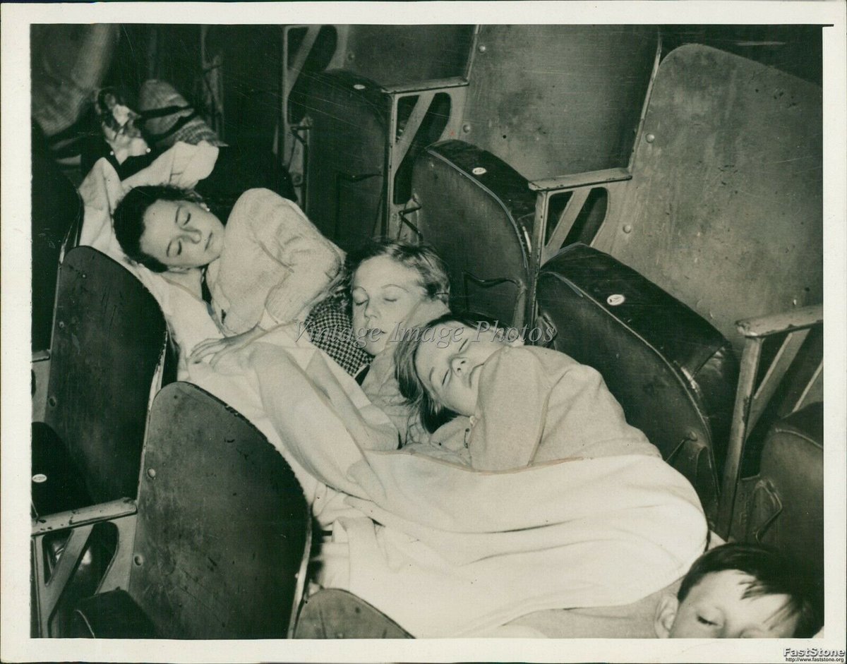 6thairborne's tweet photo. @ECHist37 27th May 1940 "Weary Belgian refugees children sleeping on mattresses placed on the floor between rows of seats in London's Empress Hall" second time in twenty years Belgian refugees homed in Earls Court. @FWWBRefugees https://t.co/UixCVCr56n
