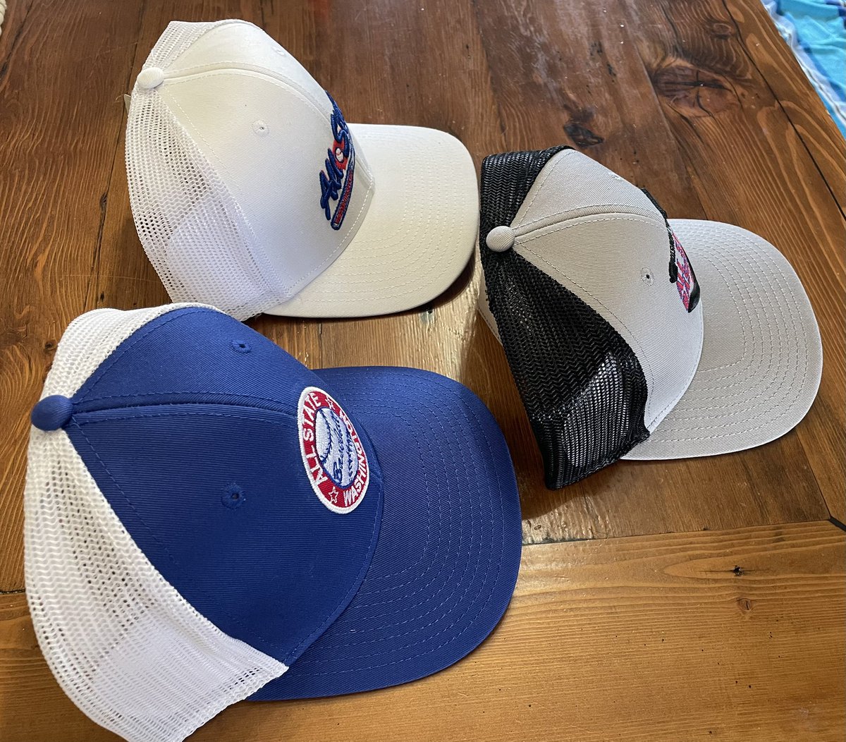 allstatewabb's tweet image. Some of our merch that we sell at the All State Series began showing up today. I absolutely love the fit on these trucker hats by The Game.