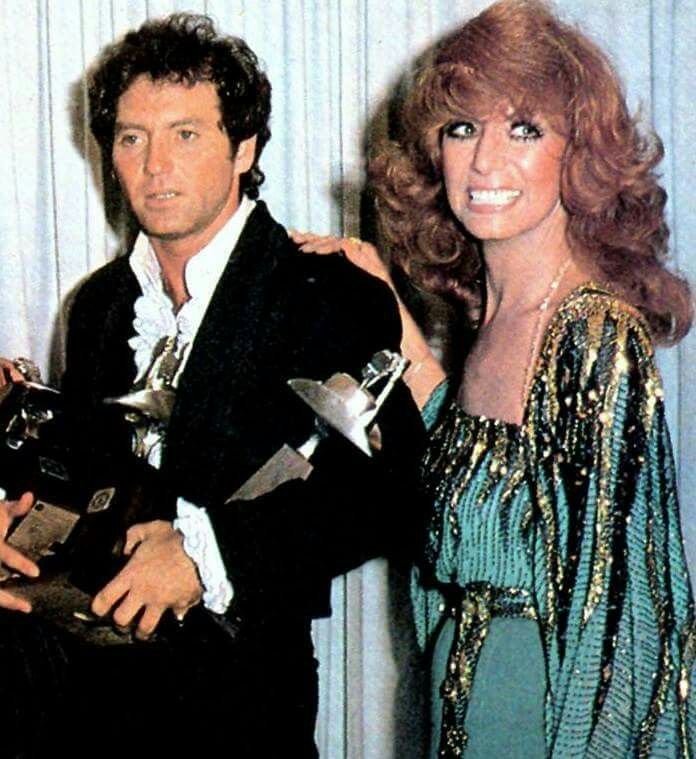 #HappyBirthday2022 @LarryGatlin Dottie West gives Larry a pat on the back after winning three hat trophies at the 1980 ACM Awards!