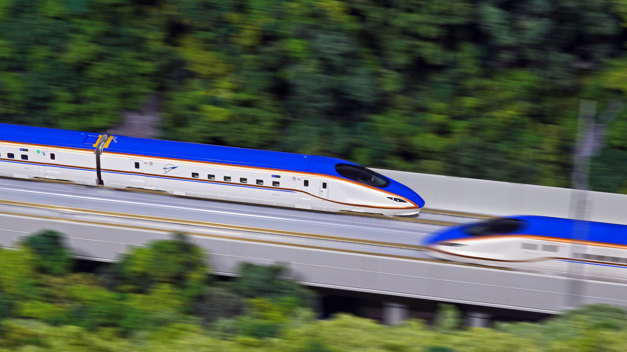 Kato営業部 急勾配に挑む E7系北陸新幹線が久々の再生産です Jr東日本とjr西日本区間を有する東京 長野 金沢を結び 50hz 60hzと異なる周波数にも対応 新幹線として最も急な30 の急勾配区間の碓氷峠 飯山トンネル等の難所を高速で駆け抜ける姿が