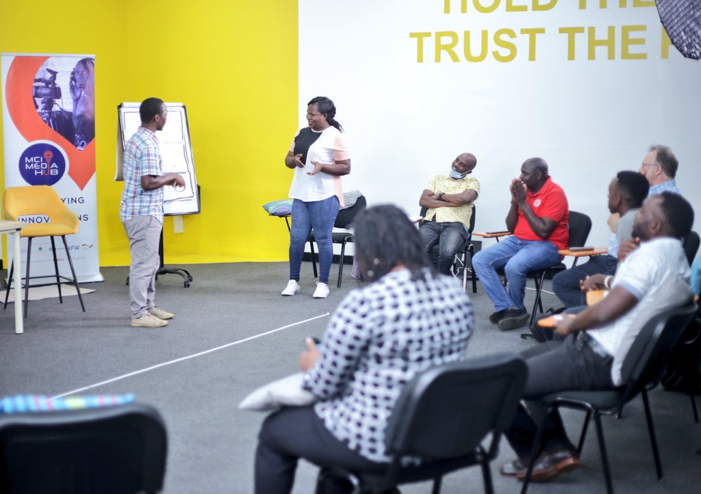 IMChallengeug's tweet photo. Our very own @MCIRadioUg manager @KakemboAli4 shares tips with the @UgandaRedCross communications volunteers and branch managers on how to conduct interviews at the #MobileStorytellingLab workshop. https://t.co/7zYDLNhgA0