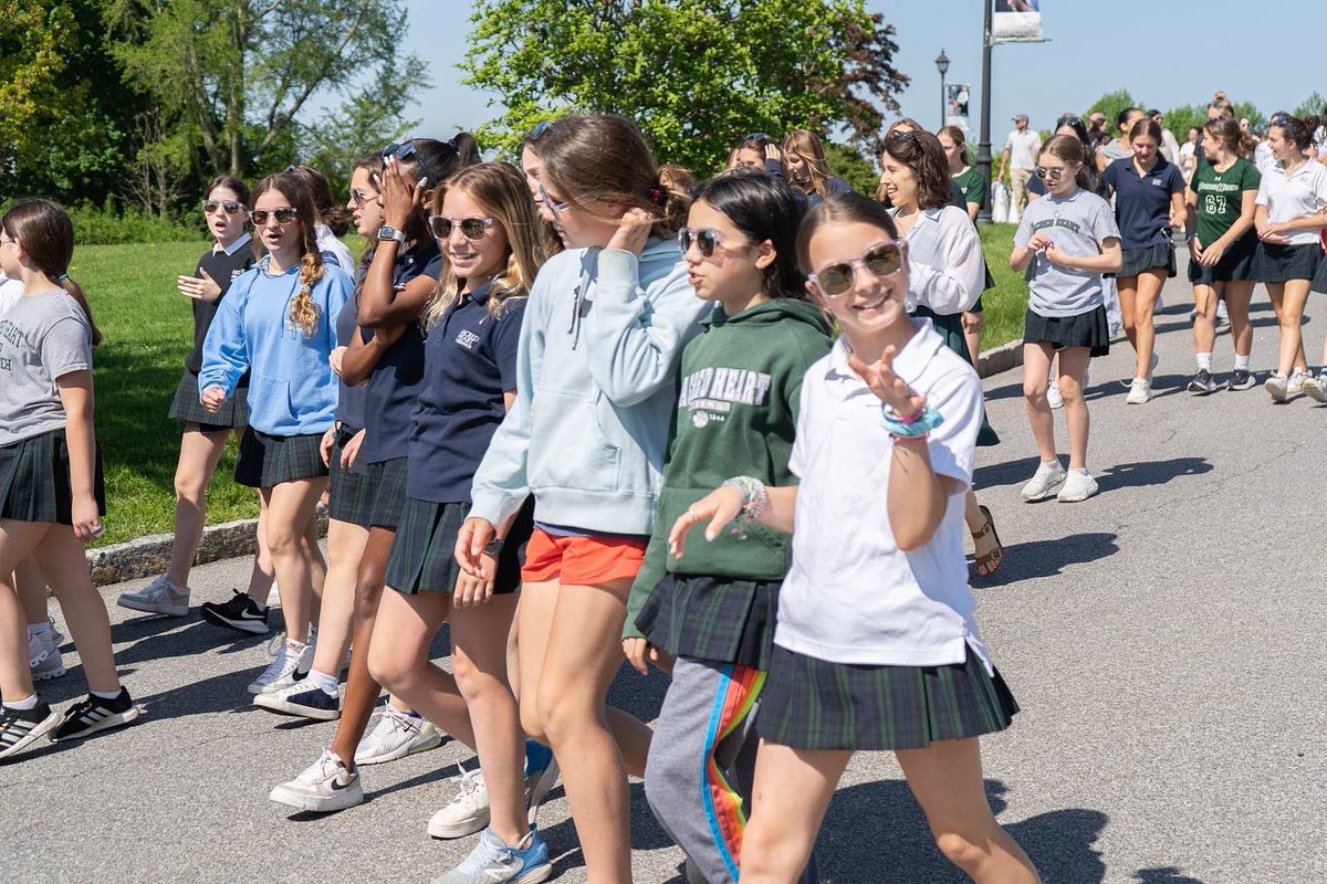 SH_Greenwich's tweet photo. Today our entire Sacred Heart community came together for a walk in remembrance of our SH sister, Vivienne Finn, class of 2027, to raise awareness and money towards a cure for DIPG. Vivienne’s Venging Vikings walked hand in hand in love and sisterhood!💚🕊 https://t.co/3g0AOagzdK