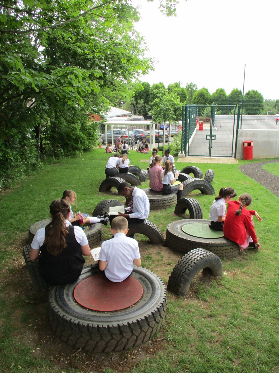 This afternoon, the children in Year 6 and Year 3 spent their reading time on the field sharing stories together. After such a long time of separating year groups, it is wonderful to see children interacting and sharing a love of reading in the sunshine.