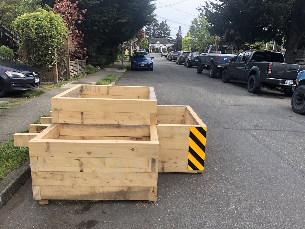 New traffic calming planter box getting installed in Gonzales. Badly needed on these small side streets. #yyj #yyjpoli #victoriabc #slowstreets