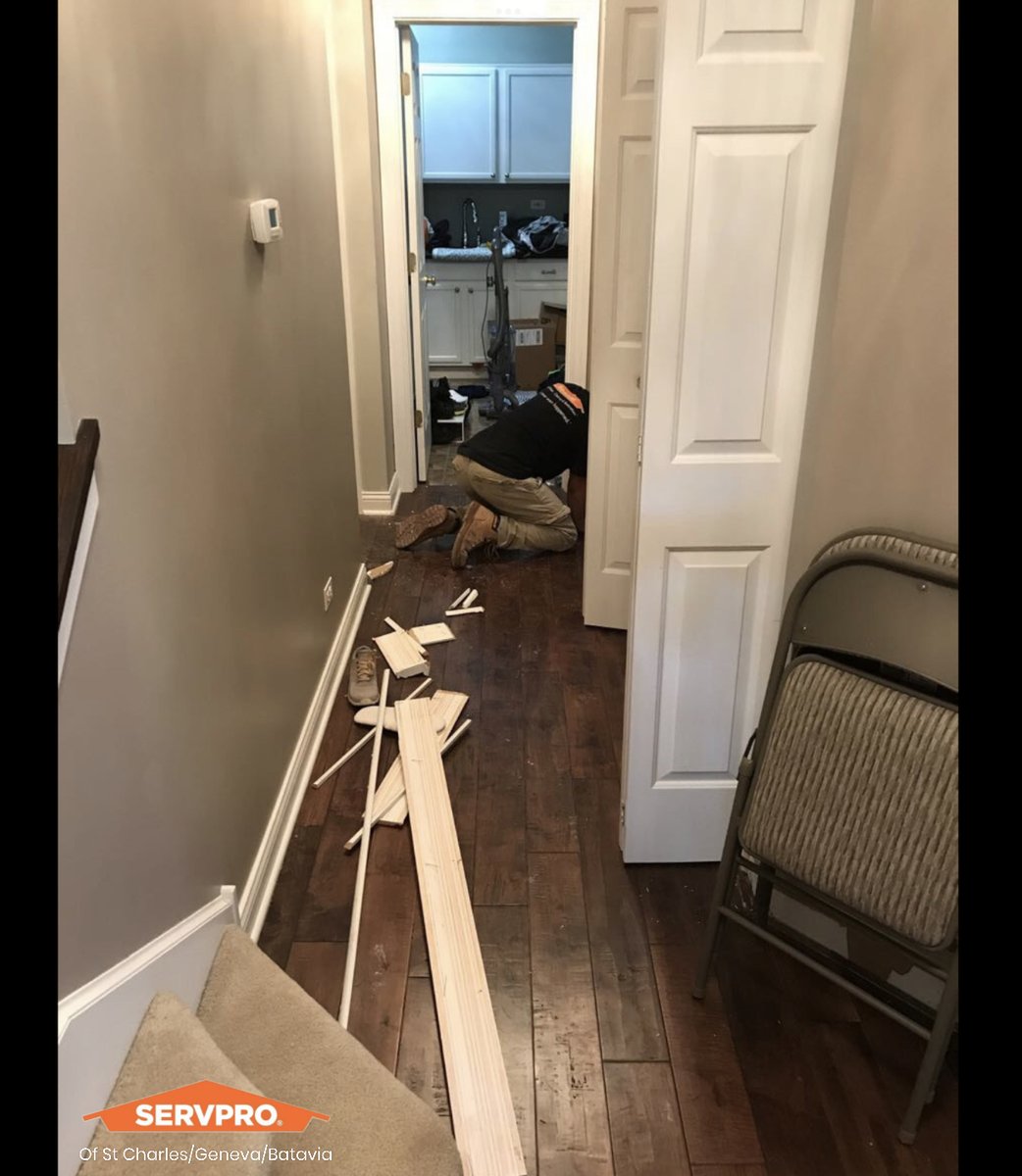 Our teams hard at work prepping for mitigation after a flood disaster in this house affected multiple levels