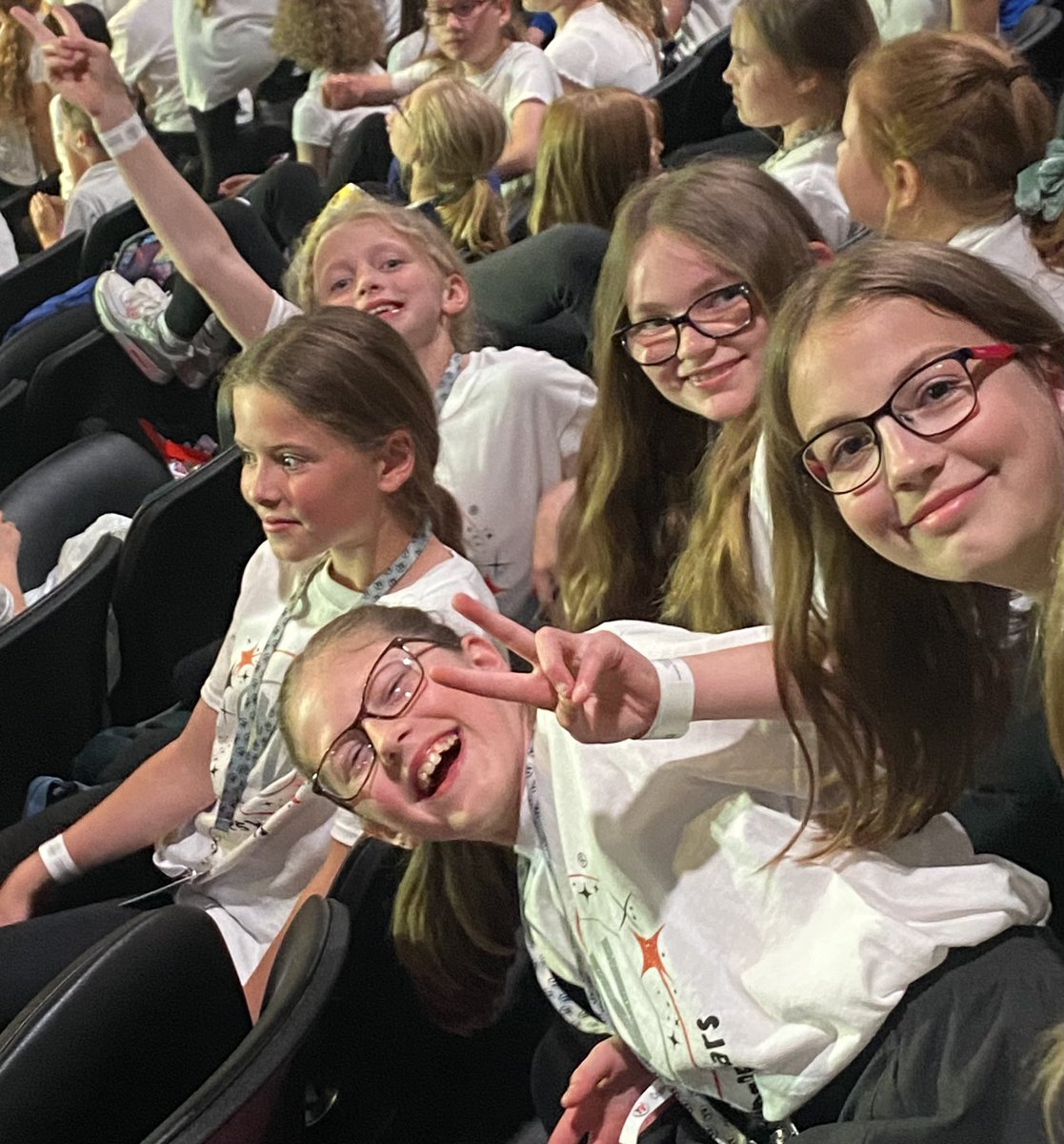 MissThornton85's tweet photo. We are excited and looking out for the grown ups who are coming to see us. We are in block 11, right at the top and our banner is just behind us! @SpaldingPriAcad @InfinityAcad @YVconcerts @CandlerHannah https://t.co/aJTKWnwH0c