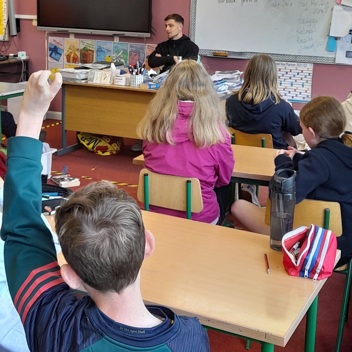CappoquinS's tweet photo. 6th Class were honoured to welcome past pupil and current international soccer star Jayson Molumby in to class today. Thank you Jayson for being so kind and answering all our questions! You look very comfortable in the teacher's chair!🟩⬜🟧😊 https://t.co/I9lO0uDoKz