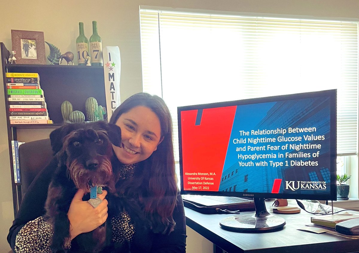 Passed my dissertation defense today! 🎉🍾 So thankful for all of the support from friends and family throughout this whole process! I didn’t have champagne to grab for the photo so next best was Matilda 😂 #PhDone #phdjourney   #AcademicTwitter #thisispedspsych