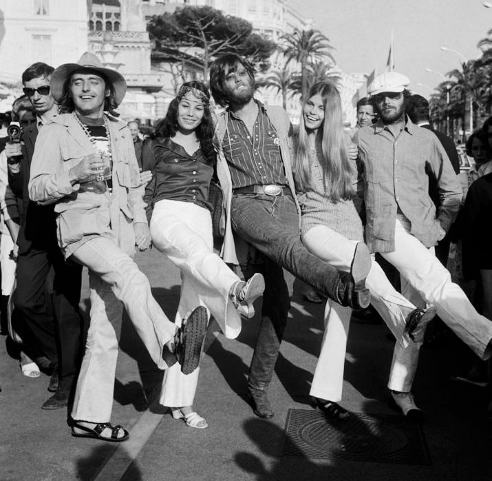#DennisHopper #BOTD May 17, 1936 – May 29, 2010 Peter Fonda, Jack Nicholson, and some friends kick up their heels in Cannes during the 1969 International Film Festival. Their film, 'Easy Rider,' won the Prix de Premiere Oeuvre for Hopper, who also directed.