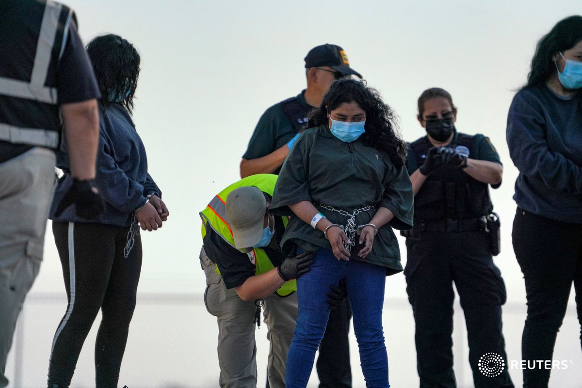 A migrant is pat-down before boarding a removal flight to Guatemala after she was determined not to have a legal basis to stay in the U.S., at Valley International Airport in Harlingen, Texas. Photo by @veronicagcarde1