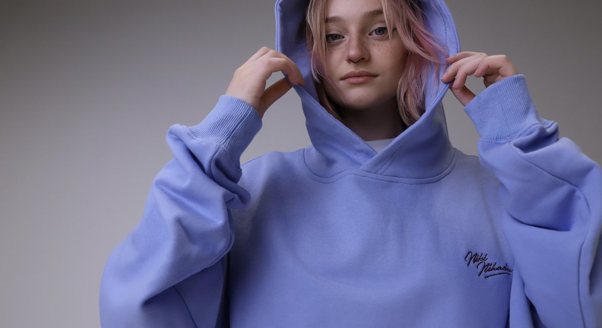 Nihachu's tweet photo. If you are wondering, I focused very hard on having as much variety as possible in this merch drop so I wanted this hoodie to be quite plain but still special through colour and cut https://t.co/Uwn8ufkkIh