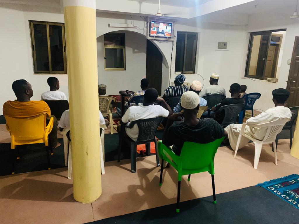 Members of the jama'at in Achimota, #Accra converged at the Taifa Mosque to climax their participation in @ReviewReligions's #TheGodSummit by watching Huzoor’s Special Message on @MuslimTVAfrica. We are grateful to all participants.