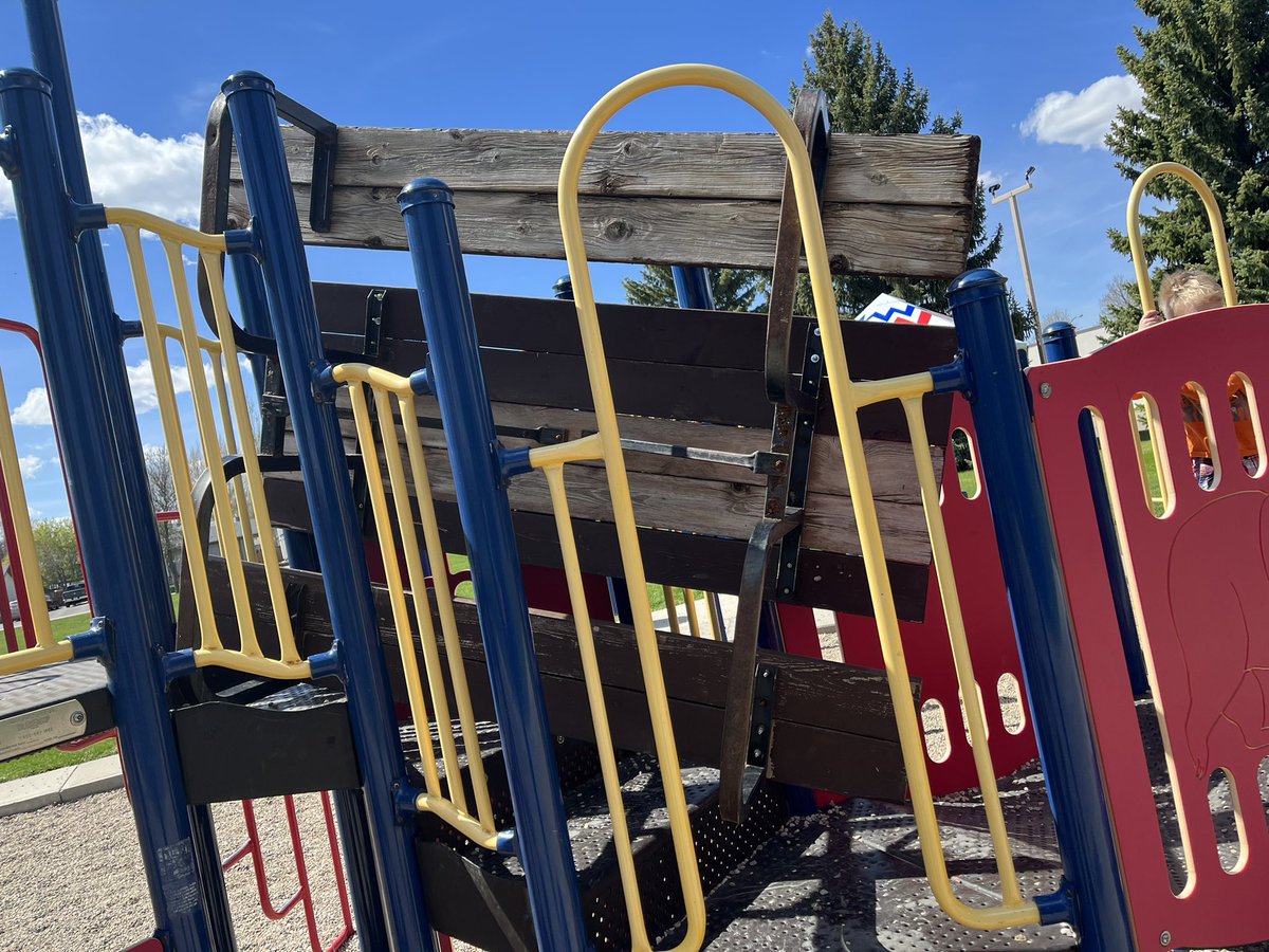 This picnic table is wedged in the playground equipment at sundance park  14/May/22 <a href="/City_SC/">Swift Current</a> @sc_play