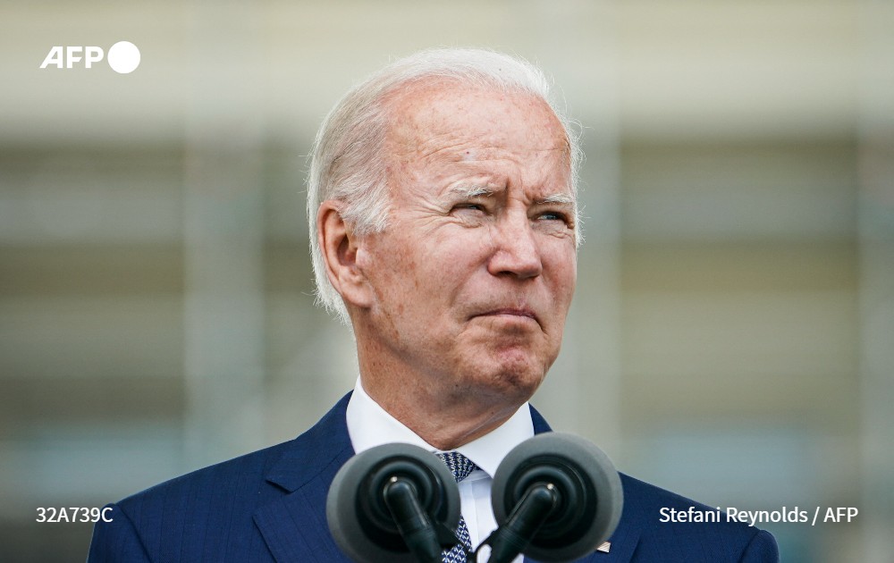 AFP's tweet photo. #UPDATE President Biden says US Justice Department investigating Buffalo shooting as "racially motivated act of white supremacy and violent extremism," calls on country to "work together to address the hate that remains a stain on the soul of America" https://t.co/8Ltb8VA7oD