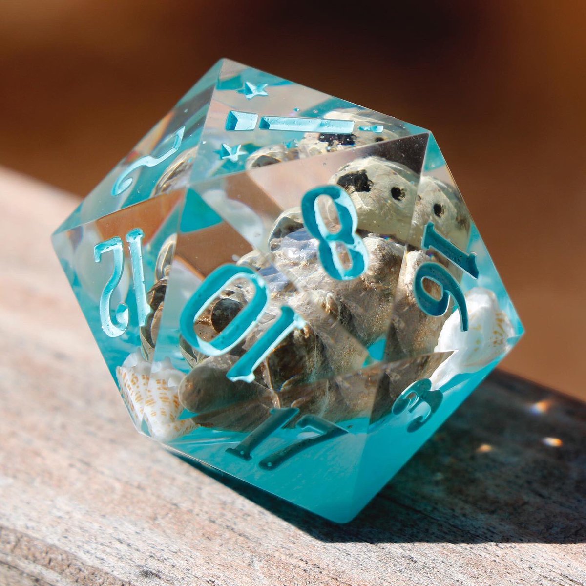 interstellarD20's tweet photo. Otter dice and many other pretties will be available in my shop update in a half hour! #handmadedice #ttrpg https://t.co/TAHQVn6KJt