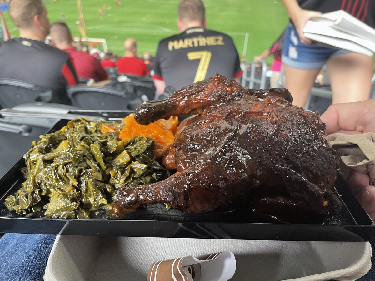 Drunken jamaican jerk whole chicken with curried collard greens and candied yams. $22 at the Atlanta United game.