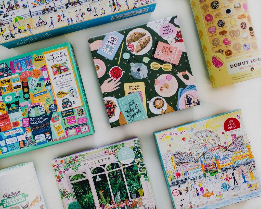 Headed to the beach this summer? Pick up one of these fun and bright new puzzles for days when you get rained in! You can find puzzles for both adults and kids in store. Adult puzzles are tucked by our Staff Picks and children's puzzles are next to our YA Picks!