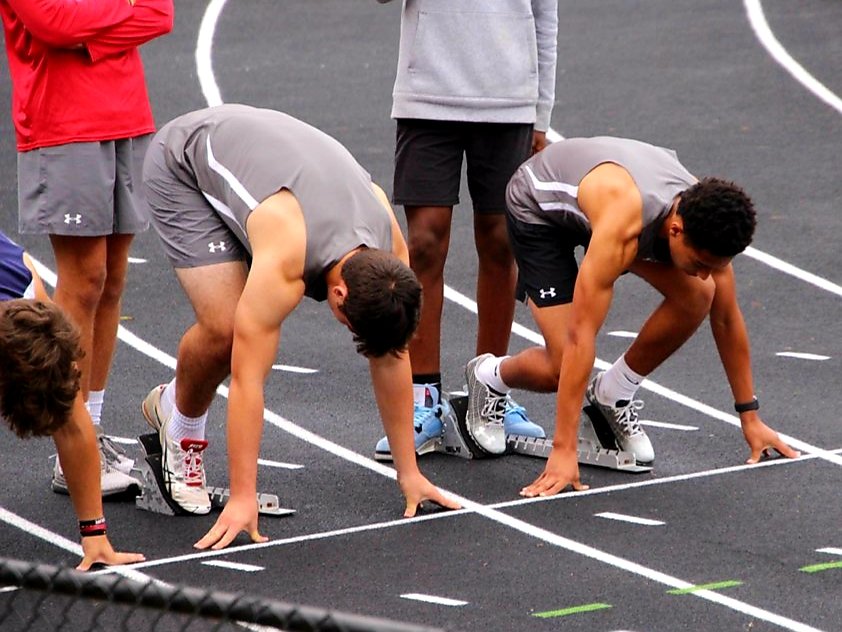 Brayden and Miles H. in the blocks in the boys 100 meters at the 2022 West Region Championships. Great job guys!