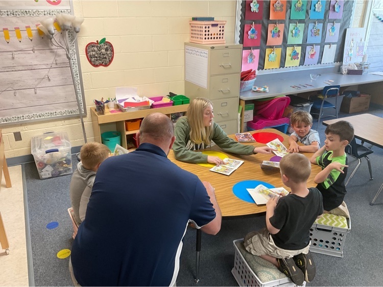 MIHemlock_High's tweet photo. #Leaders are learners, Principal Keith Green participates in a reading center while doing an instructional walk through. #huskietastic https://t.co/4YXVP8ktcT