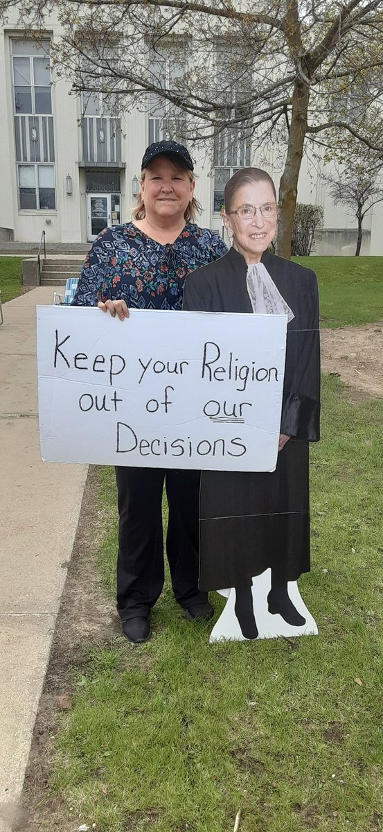 CathyGoike's tweet photo. Had a reproductive rights rally in rural NE Michigan today.  So many people came with signs and megaphones. my son's first rally and he's hooked. Way more supportive honks and thumbs up than expected. https://t.co/kZJrhzitU8