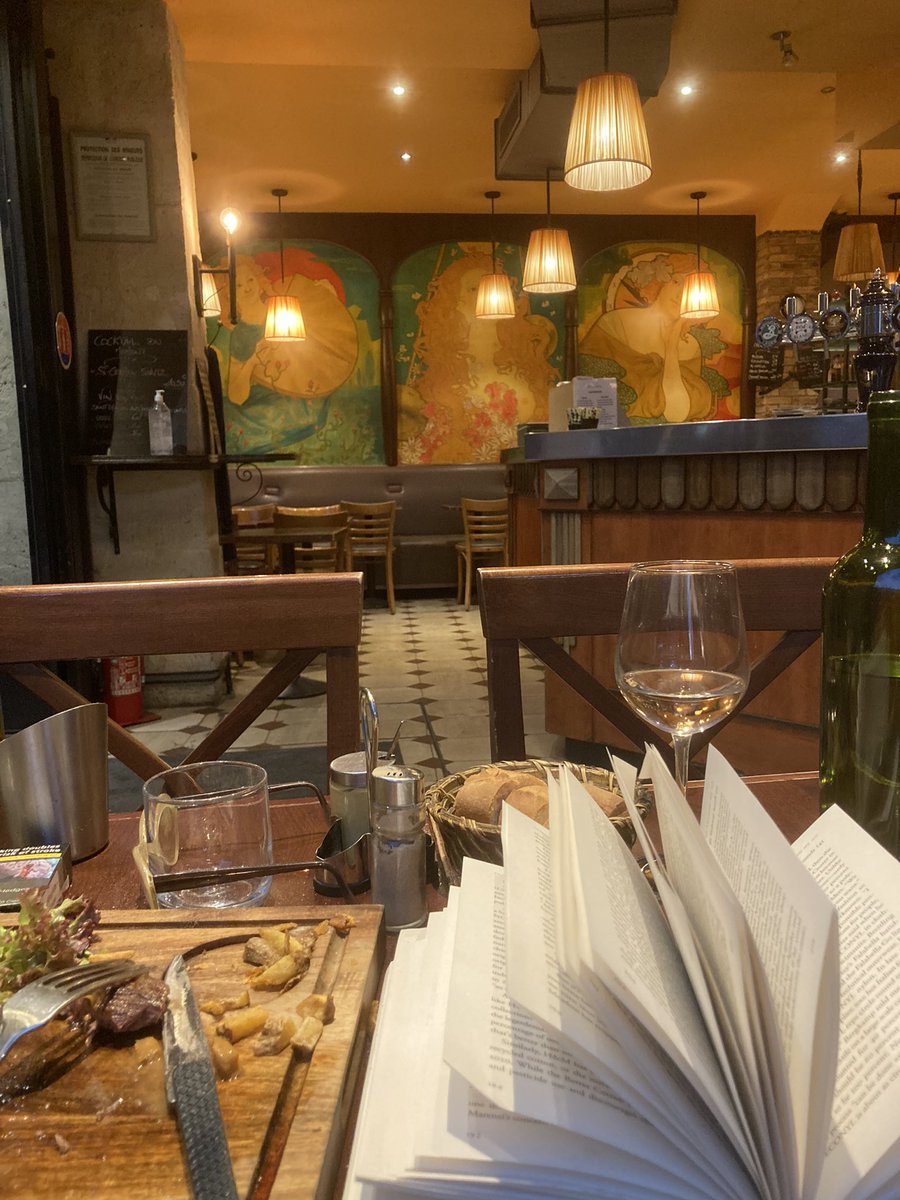 georginagodwin's tweet photo. My feet hurt (after massive flea market trawl) so went local and am pleased to report #cafeducadran on Rue Daunou well worth a visit. My companion is @DanaThomasParis book #fashionopolis. https://t.co/5Jo0SSRuLY