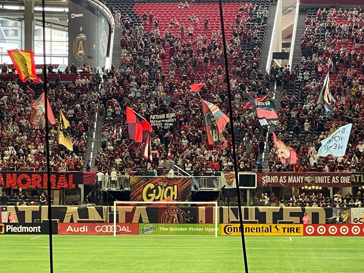 defendATLforest's tweet photo. Banner dropped at #AtlantaUnited game today demanding Arthur Blank, founder of Home Depot and owner of Atlanta United, divest from Cop City. https://t.co/S3cmynVnwH